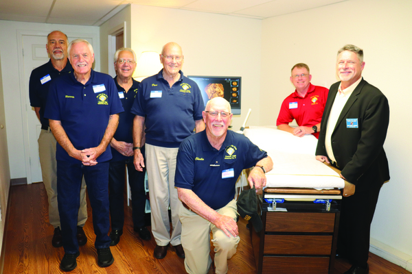 Knights of Columbus members' names from left to right: Dan Bradl, Steven Schwalbe, Al Digmann, Dave Laurin, Charlie Hackmann, Andy Love, and Rocky Gambon.