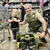 Chief Deputy Tim Gideon picking our a monster truck with his shopper.